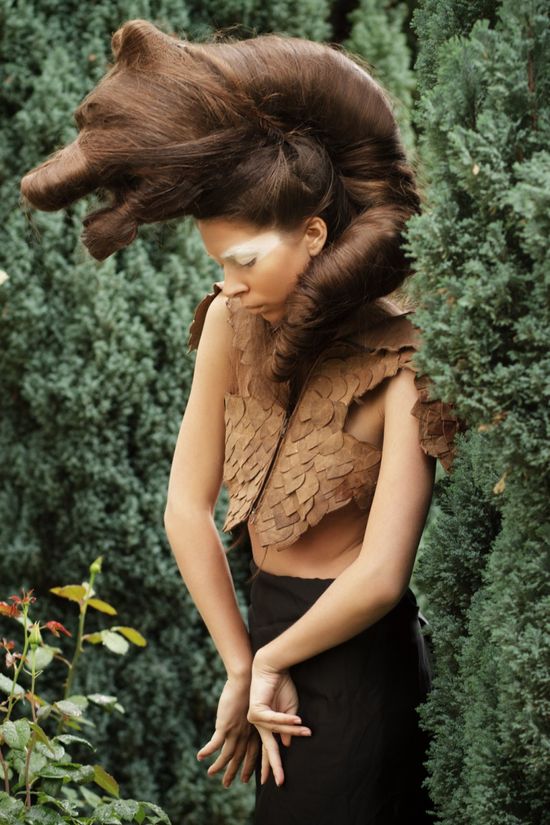 Alexandra wearing a creative fantasy hairstyle with natural textures and a dramatic editorial styling
