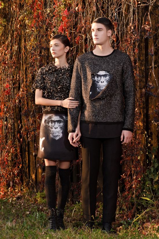 AW11 fashion portrait of male and female models posing outdoors against a wall covered in autumn ivy vines.